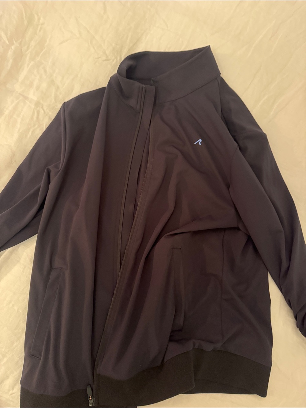 Redvalley Black Jacket with Red Logo Tag